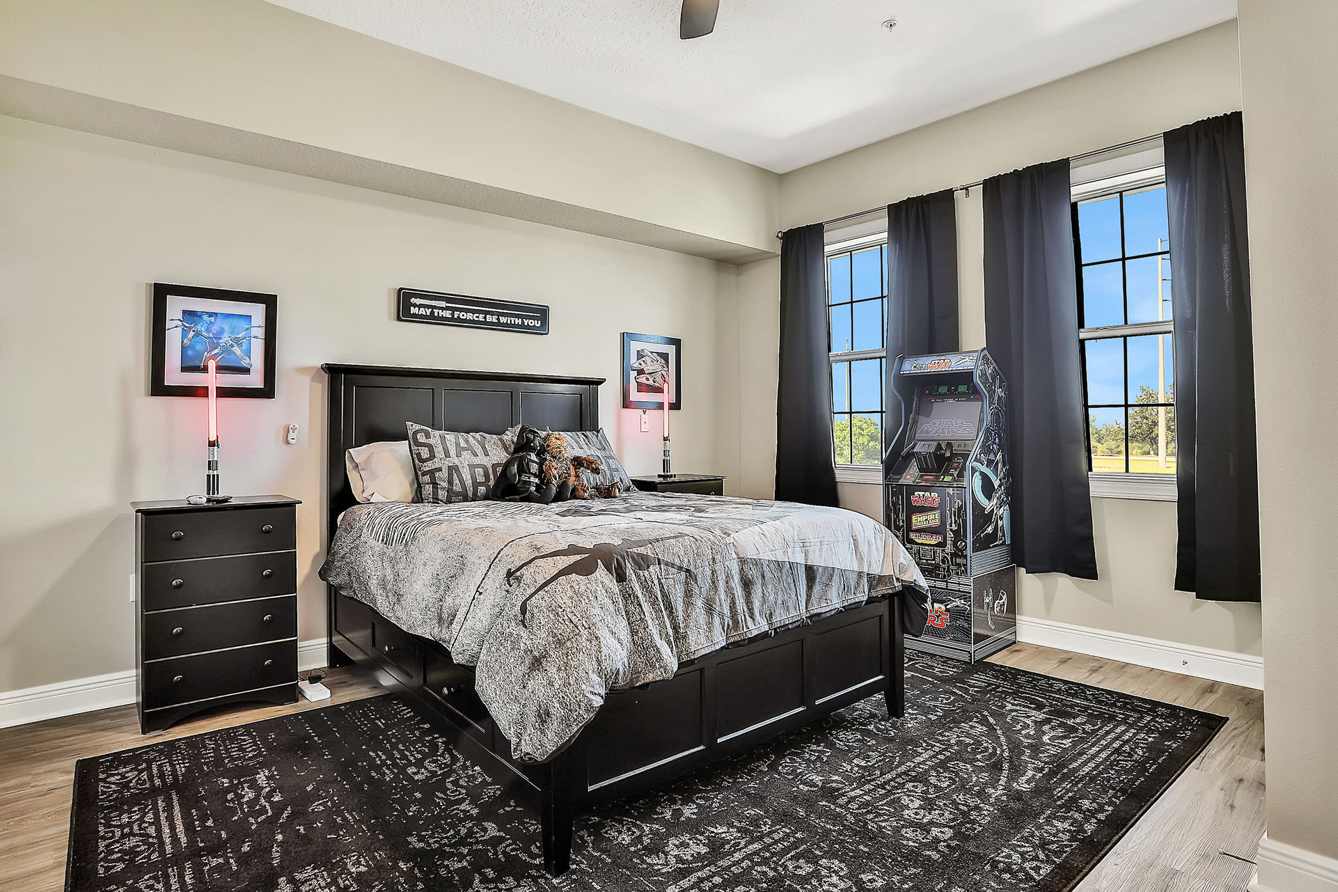 The galaxy-themed bedroom is sure to please with high attention to detail and a Star Wars Atari arcade