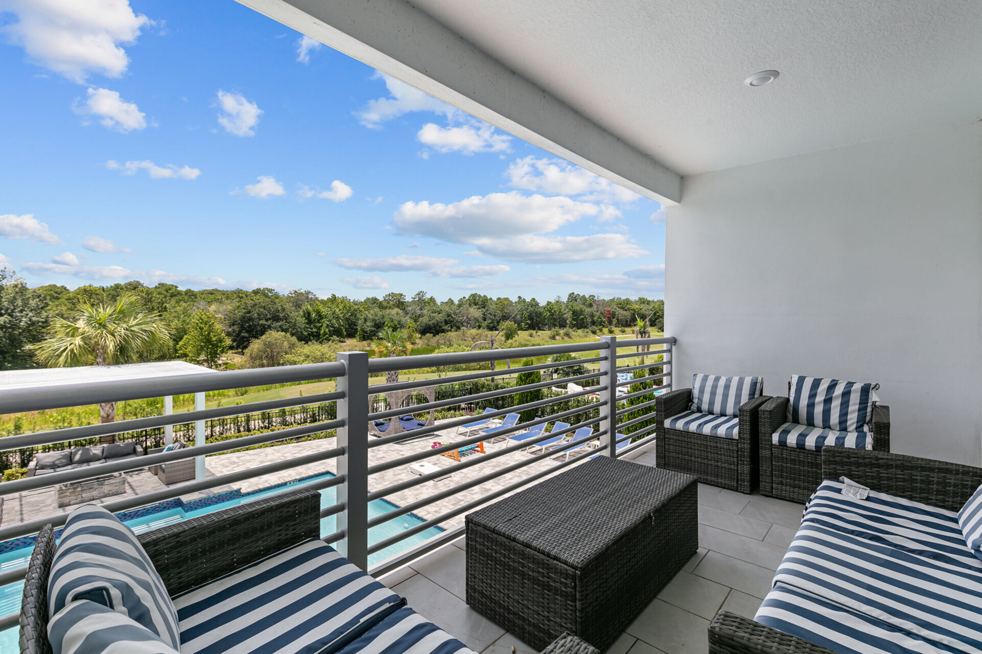 Access the second-floor balcony from the loft which has cozy patio seating