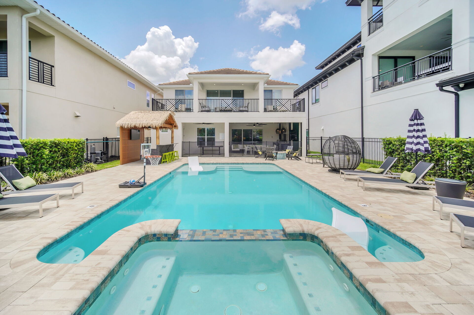 The perfect place for swimming, sunbathing, or hosting outdoor gatherings, this space offers both relaxation and style