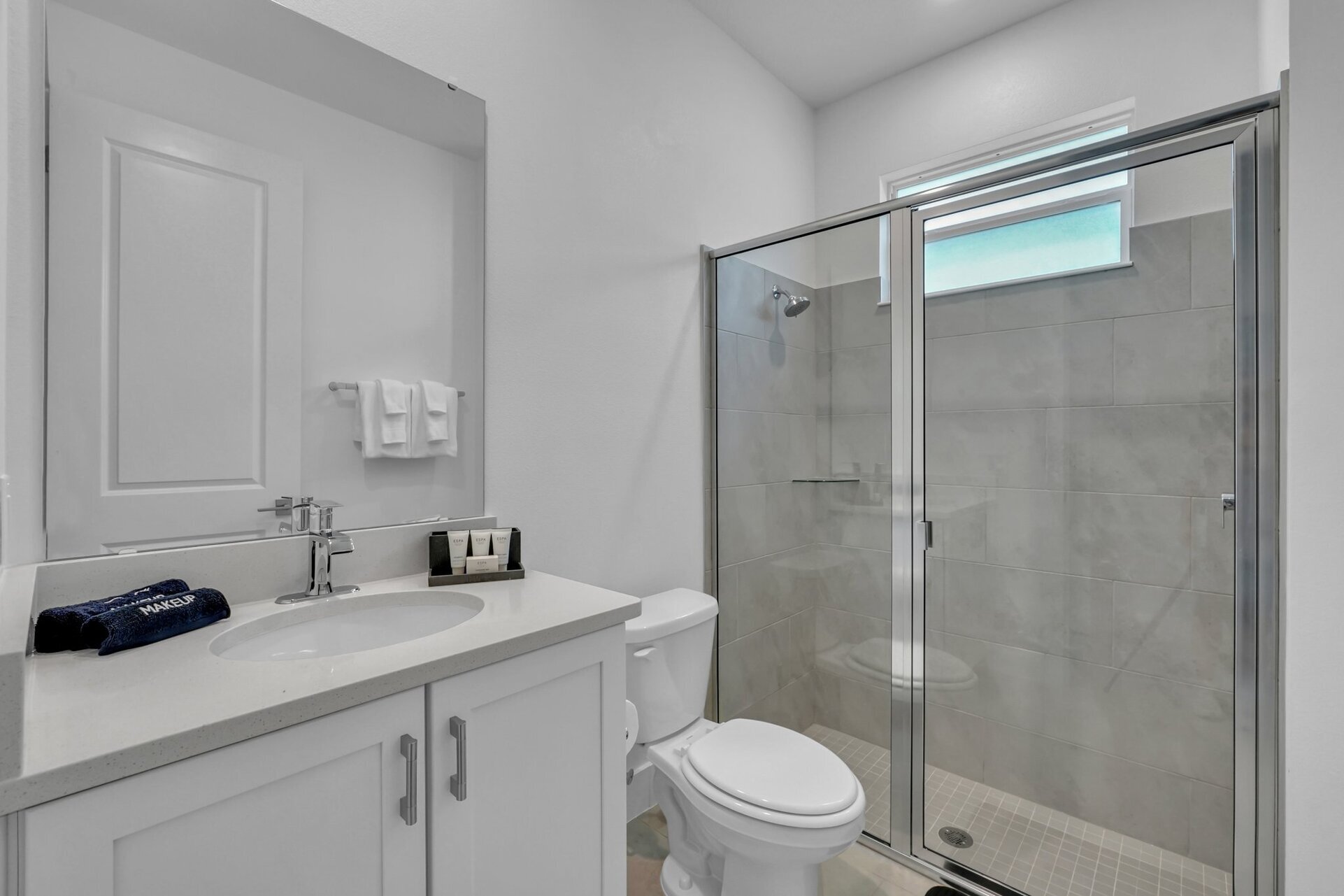 Enjoy the convenience of an en-suite bathroom featuring a walk-in shower for a refreshing start to your day