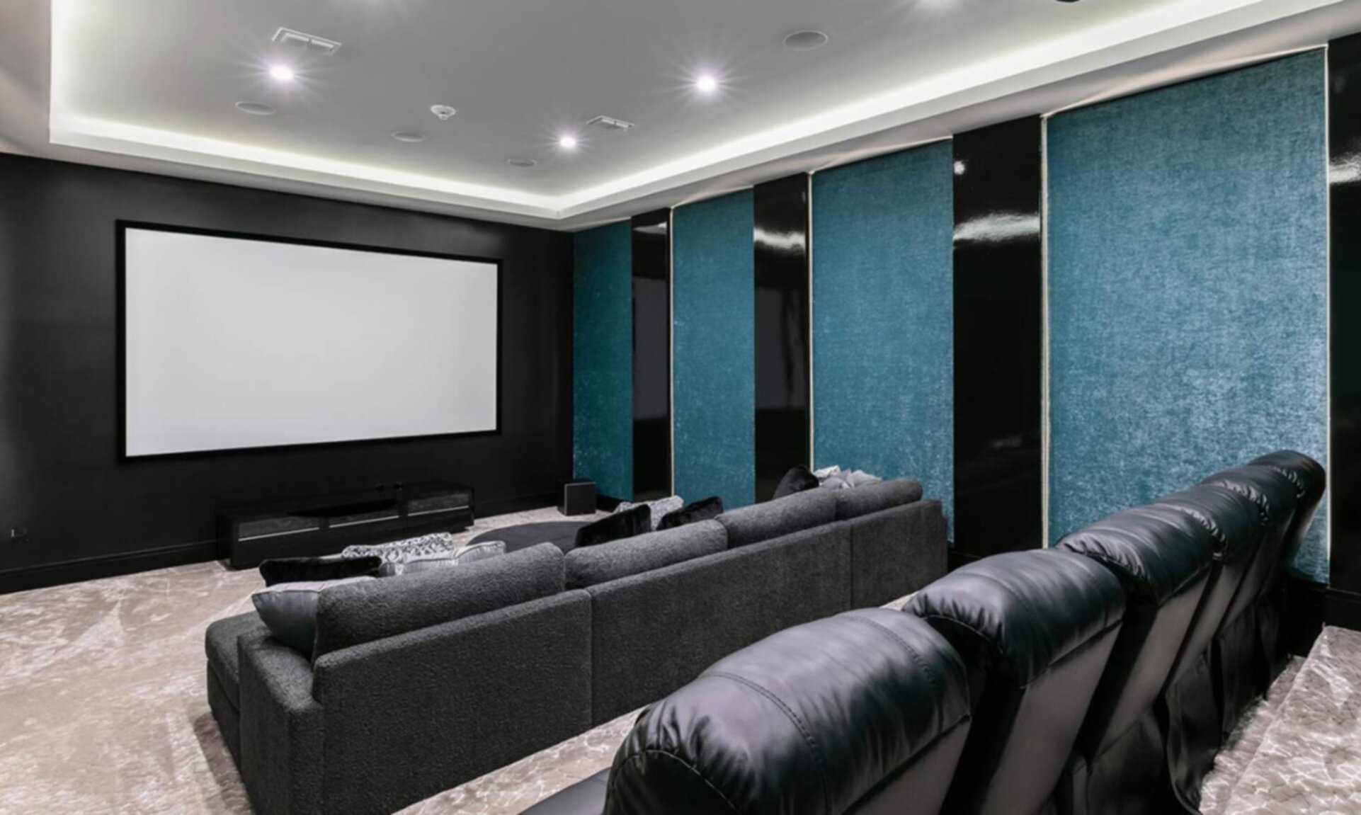 Movie Theater with Acoustical Walls Lined with Velvet and LED Lighting