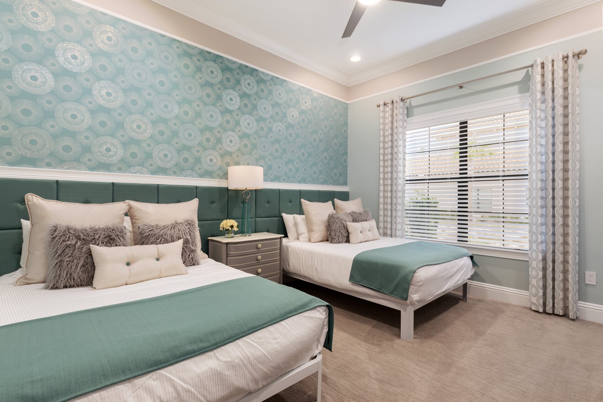 Rest easy after a long day in this plush Queen beds, offering the ultimate in comfort and relaxation