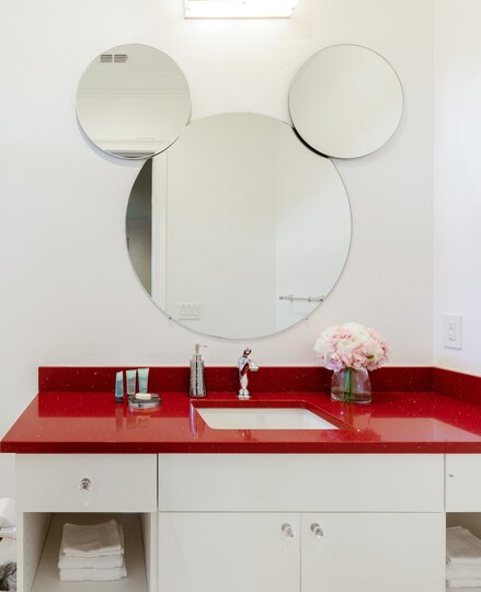 Refresh yourself in the modern shower area, featuring sleek fixtures and ample space for a rejuvenating experience