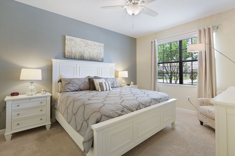 A second master suite complete with a king-sized bed