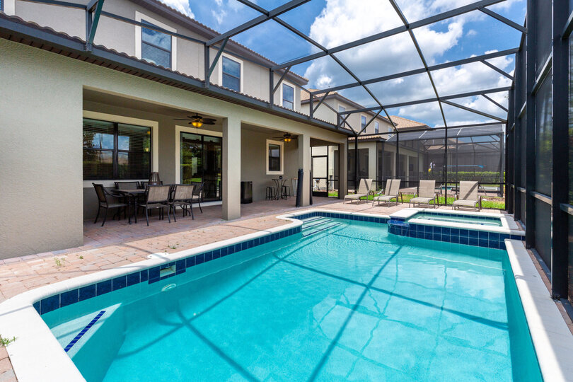 Enjoy a drink poolside at the dining table for 6