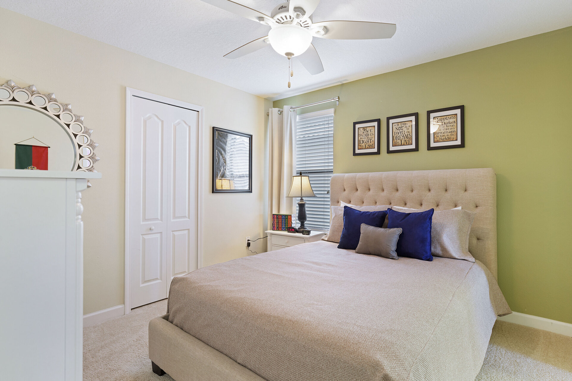 Sink into this plush queen-sized bed after a day of Orlando attractions