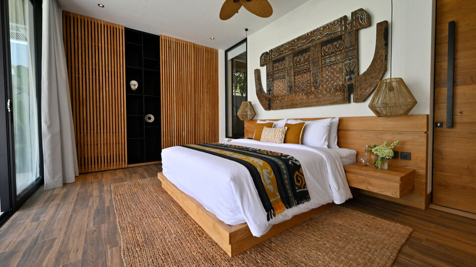 Intimate guest bedroom by the balcony