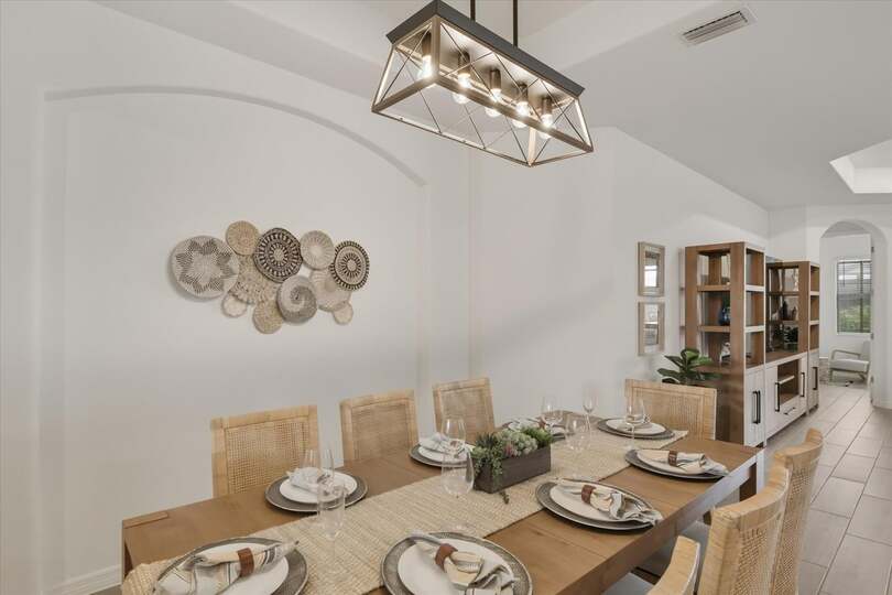 Dining area. Dining table seats 8with additional seating for 4 at the kitchen island