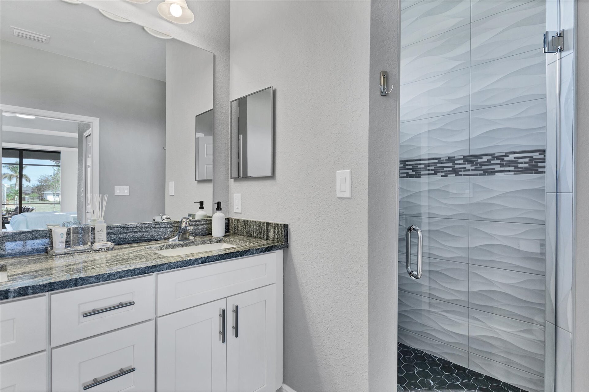 Primary bathroom with walk-in shower, soaking tub and double vanities