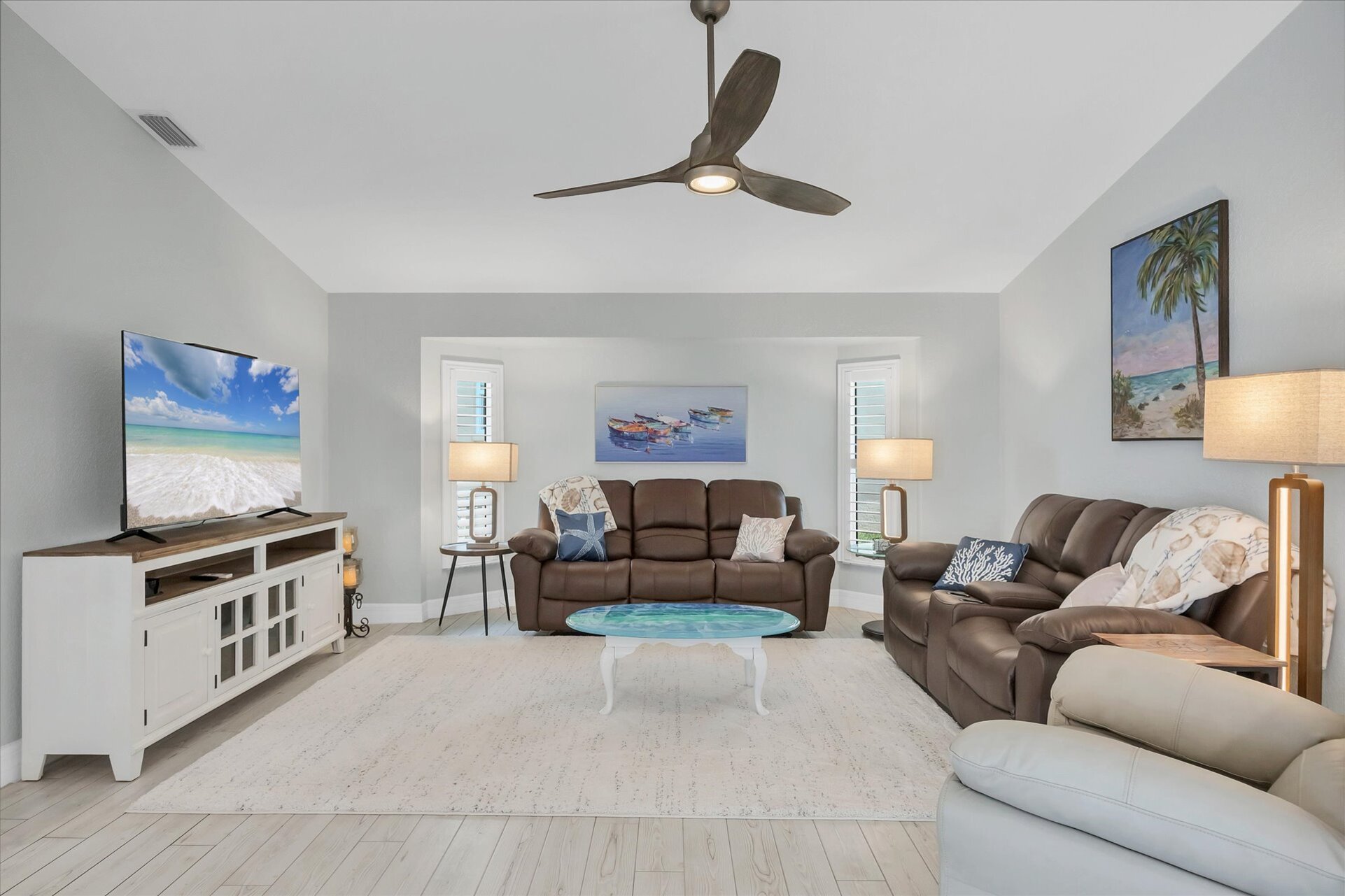 Bright, open living space with 65" TV