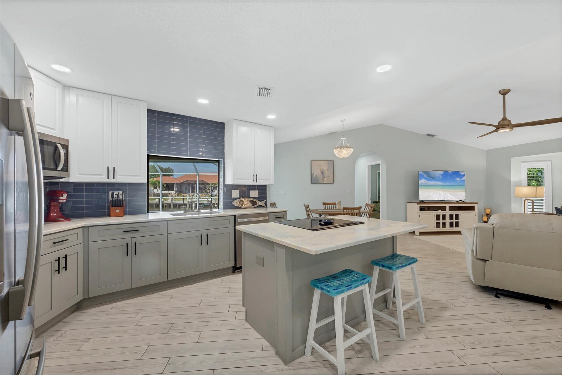 Beautiful, fully-equipped kitchen with new appliances. Kitchen island seats 2
