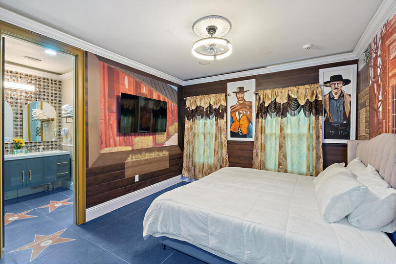 The Good The Bad and The Ugly King Suite Bedroom 10 Upstairs 55" Roku TV