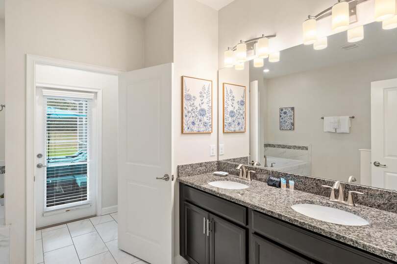 Master King Bathroom 1 Downstairs Tub & Shower Door to Pool