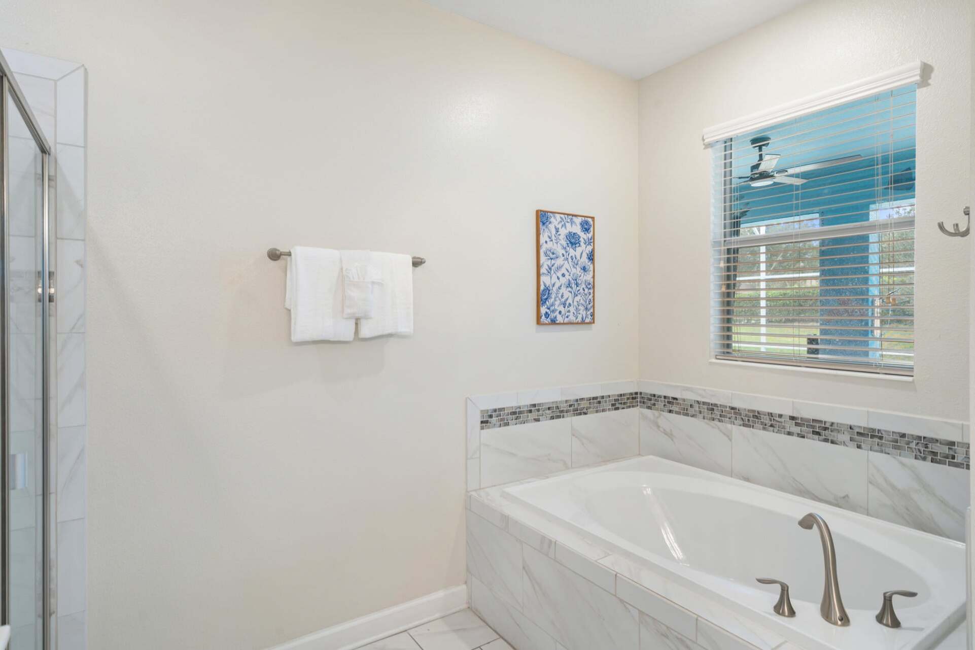 Master King Bathroom 1 Downstairs Tub & Shower Door to Pool
