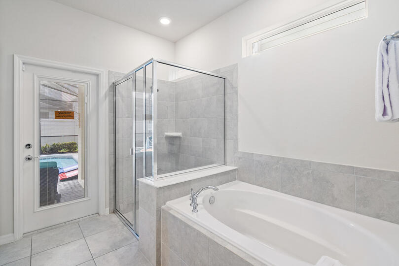 Master King Bathroom 1 Downstairs Tub & Shower Door To Pool