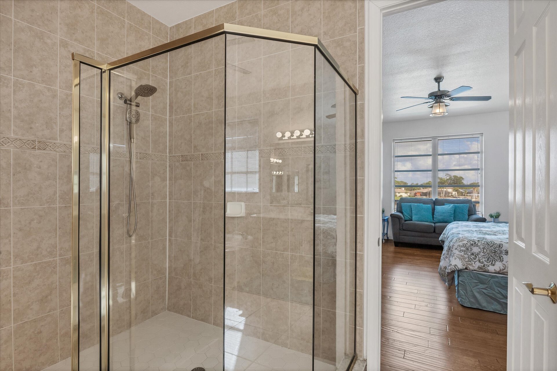 Primary attached bathroom with walk-in shower, garden tub, double vanities and huge walk-in closet