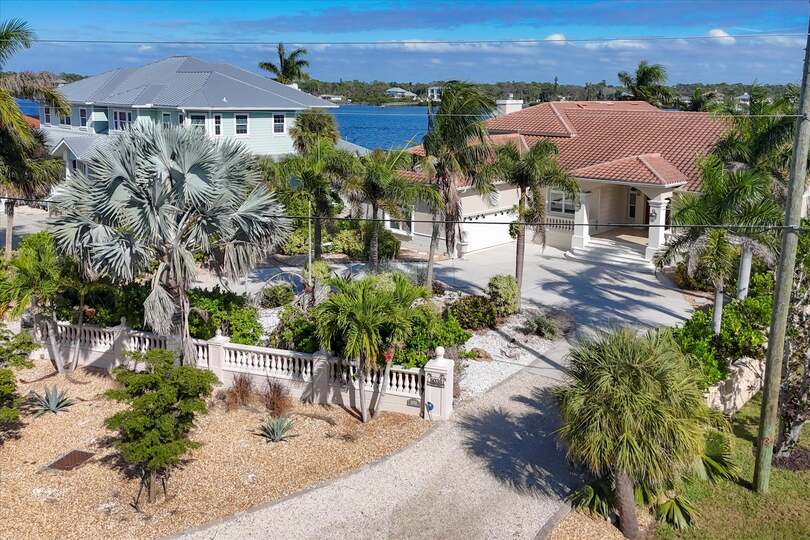 Stunning 5/4 waterfront home with private pool and beach access on Manasota Key island in Englewood, FL