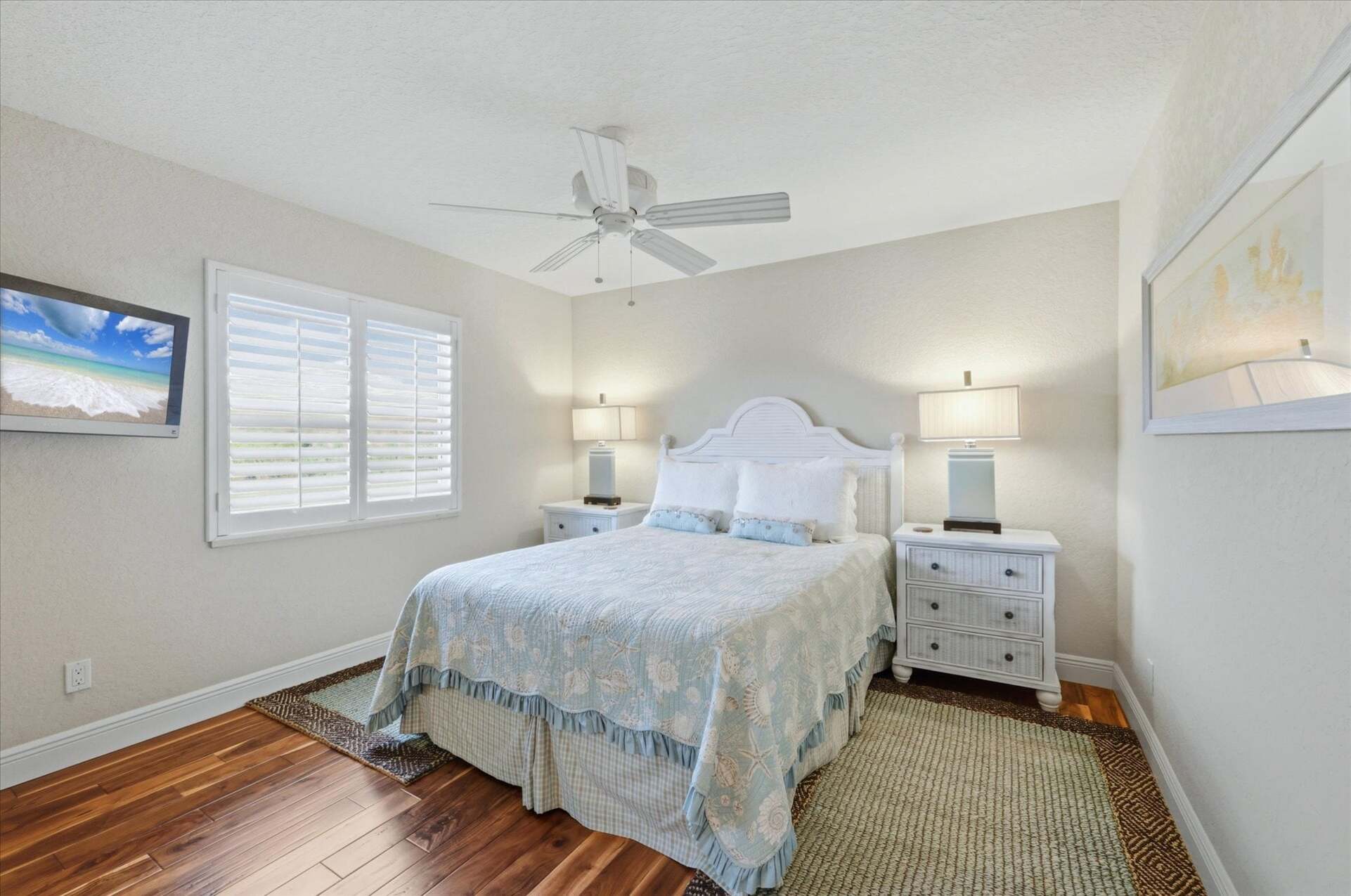 Guest bedroom 1 with queen bed and 32-inch Smart TV
