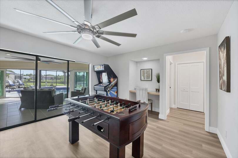 Game Room with Foosball Table and Arcade Game