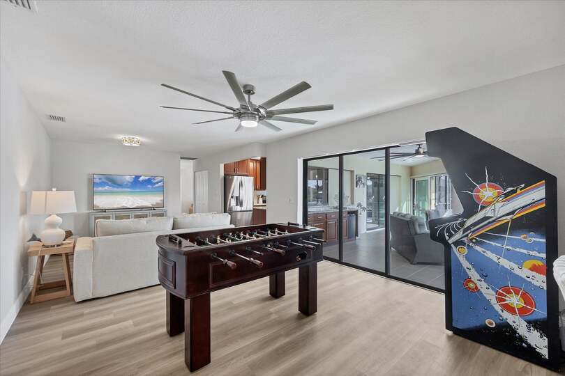 Game Room with Foosball Table and Arcade Game