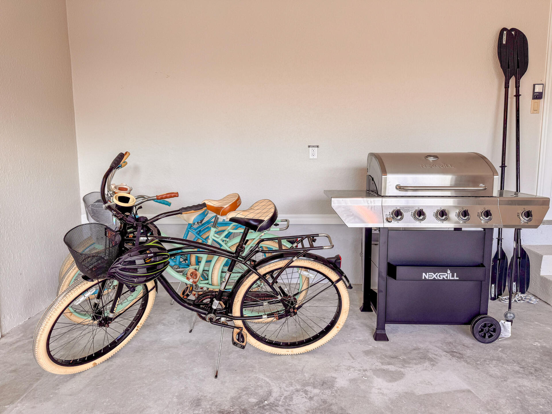 3 bicycles and BBQ grill