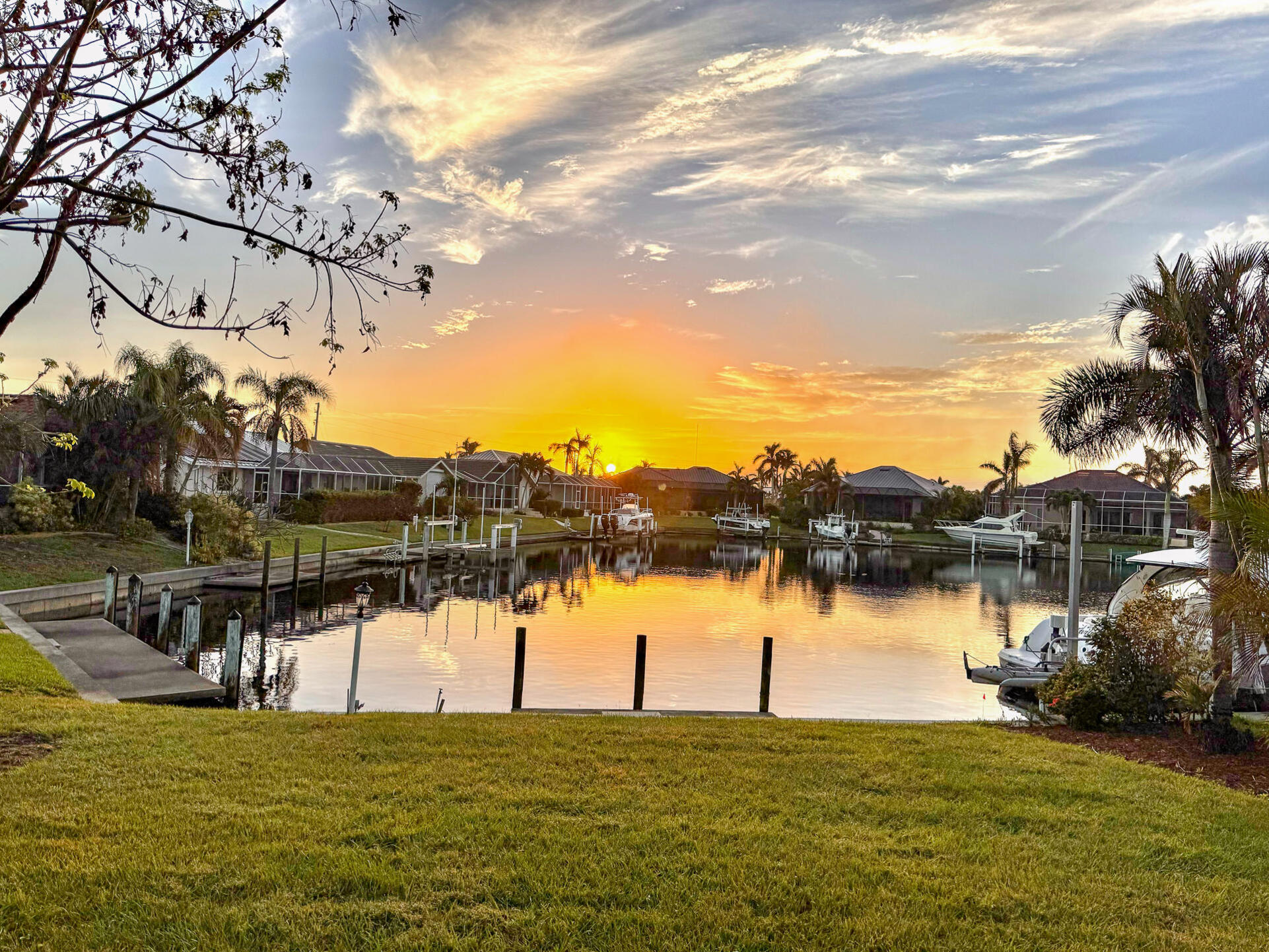 This charming residence features 40 feet of serene waterfront. The wide canal and spacious basin offer quiet waterfront living, complete with privacy from across-canal homes, no boat traffic or wakes. (Boat lift not available)