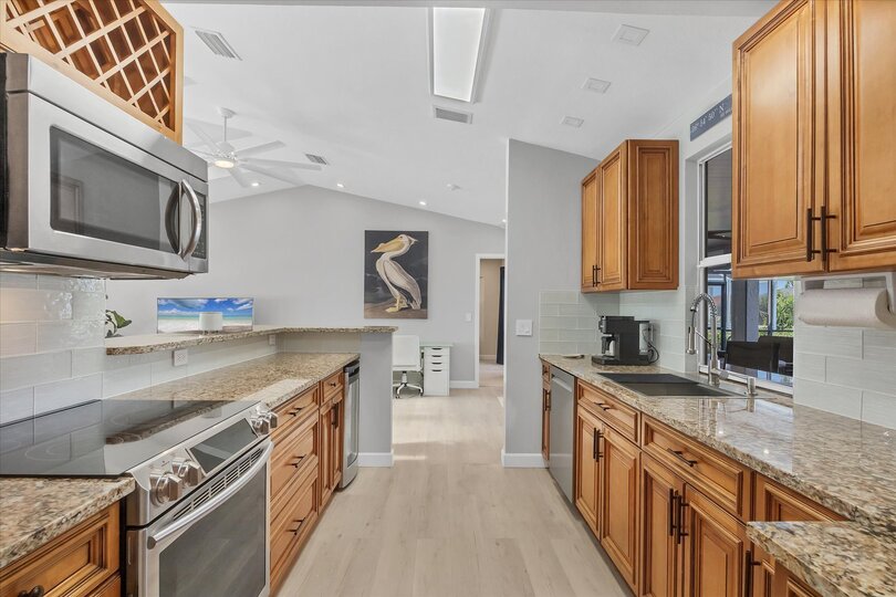 Fully-Equipped kitchen with plenty of counter-top space and new stainless-steel appliances