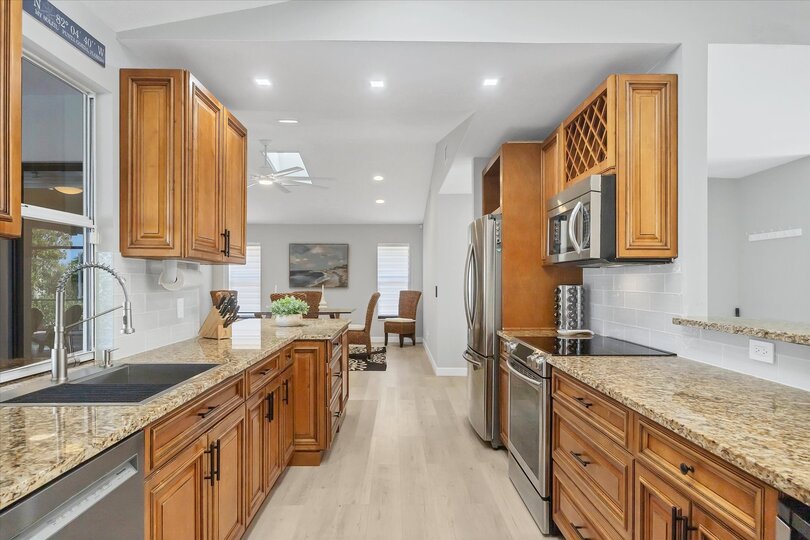 Fully-Equipped kitchen with plenty of counter-top space and new stainless-steel appliances